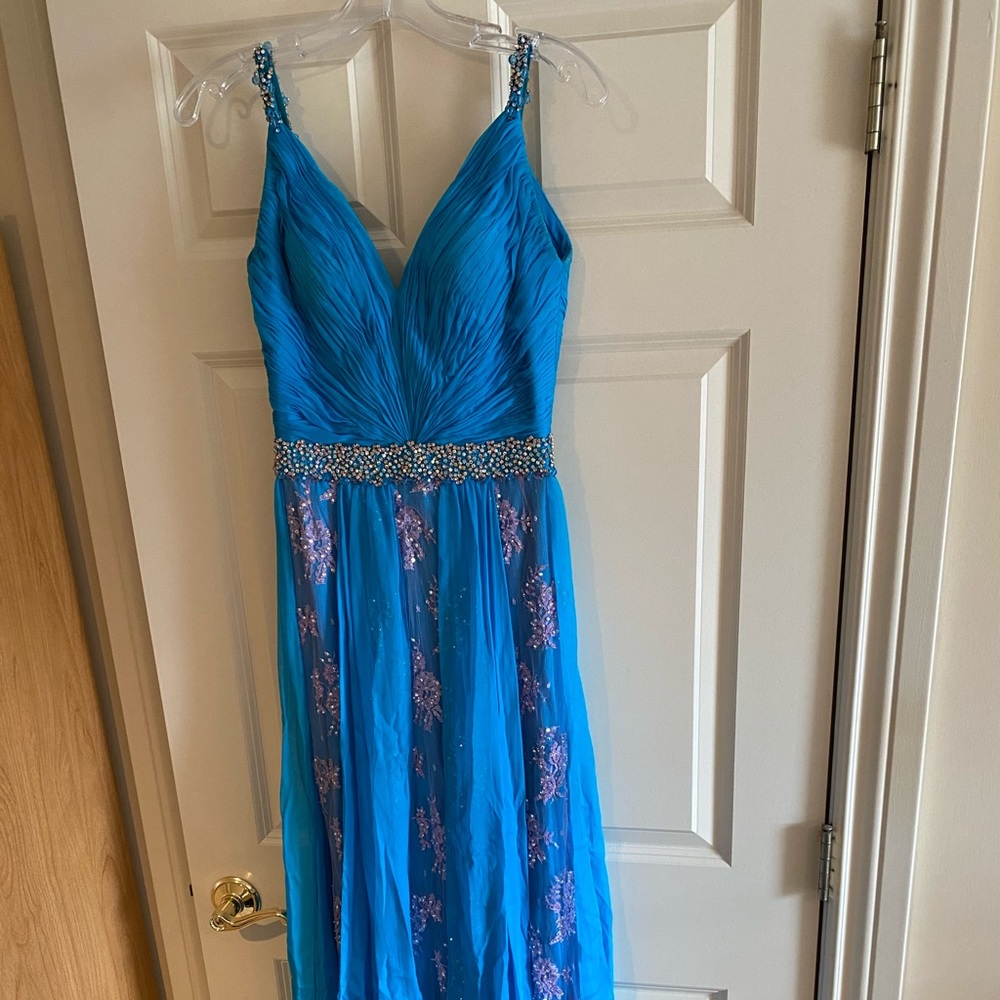 Women’s dress size small.  Blue with pink lace.  Swarovski crystals.